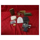 Vintage camera, medical equipment, books.