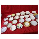 Assorted vintage saucer plates.
