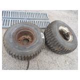 26x12.00-12 tractor tires on steel rims.