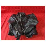 Size 42 Leather motorcycle jacket. Zody inc.