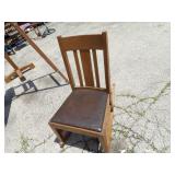Old quarter sawn oak rocking chair.