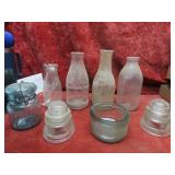 Old milk bottles, glass insulators, ball jar