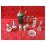 Lidded beer stein, candle holder, shakers.