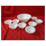Scalloped milk glass bowl set.
