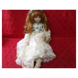 Vintage porcelain doll. Paradise galleries.