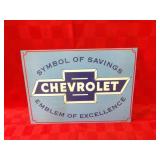 Metal Chevrolet sign.