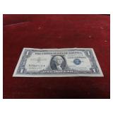 1957A-Silver certificate $1 US banknote.