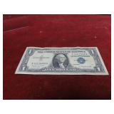 1957A-Silver certificate $1 US banknote.