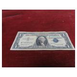 1957B-Silver certificate $1 US banknote.