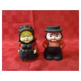 (2)Cast iron Amish figure banks.