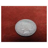 1928-s 90% silver US coin. Peace dollar.