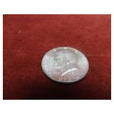 1964- 90% silver US coin. Kennedy half.