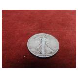 1944 90% silver US coin. Walking liberty half.