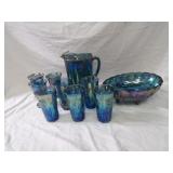 Carnival glass pitcher set, bowl.