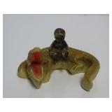 Chalkware Boy on Alligator figure.