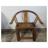 Chinese Elm Horseshoe back armchair.