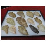 (13)prehistoric Native American arrowhead points.