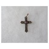 Sterling silver cross pendant.