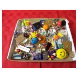 Assorted vintage keychains, charms.