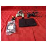 PS2 game console & accessories.