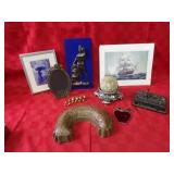 Scale weights, jello mold, frame, prints.