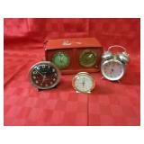 Old silvertone radio, alarm clocks.