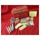 Train case, spools, bobbins, sewing related.