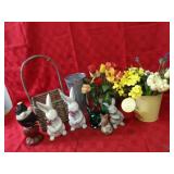 Rabbit figures, baskets, watering can.