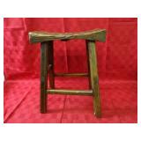 Primitive wood stool.