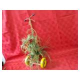 Vintage child's push toy, flower pot decor.