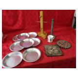 Mug holders, pie plates, hot pads.