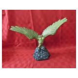 Brass eagle figure.
