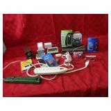 Pencil sharpener, power strips, calculator.