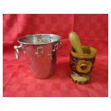 Wine chilling bucket, mortar & pestle.