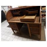Antique roll top desk. needs repair.