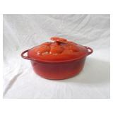 Red cast iron dutch oven.
