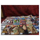 (20)Assorted TV guide magazines.