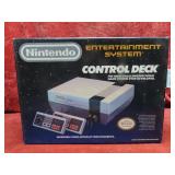 Vintage Nintendo game console & accessories