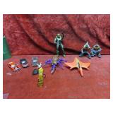 Assorted action figures & diecast cars.
