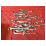Assorted wrenches, tools.