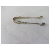 Sterling Silver sugar tongs.