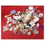 Assorted keychains & pins. advertising.
