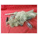 Vintage fishing net, lead weights, hooks, misc.