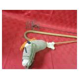 Toy horse, cane, wrought iron stand.