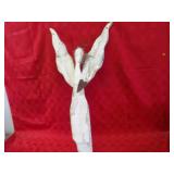 Folk art angel figure.