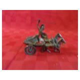 Cast metal chariot & horse figure.