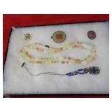 Showcase of Deco & misc jewelry.