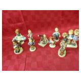 (9)Hummel porcelain figures.