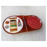 Silver lid faux tortoise shell sewing compact