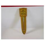 Kent Co-op metal thermometer sign.